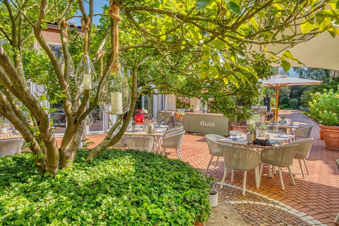 Vila Vita Rosenpark Marburg Zewnętrze zdjęcie The garden of the restaurant
